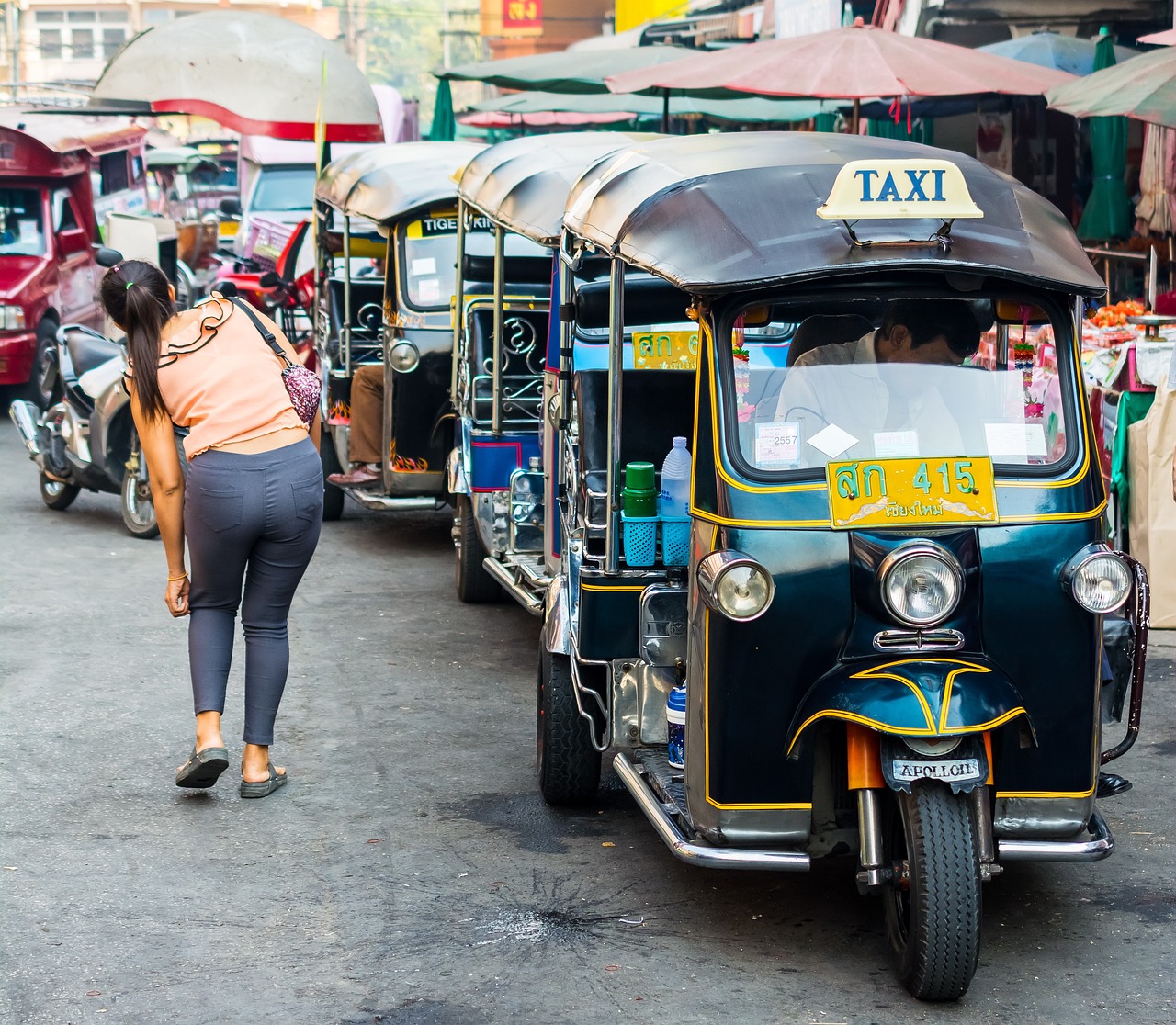 How to Get Around Chiang Mai: Songthaews, Tuk Tuks, and Scooter Tips